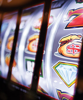 slot machine money bags and diamonds