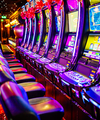 A row of electronic slot machines.